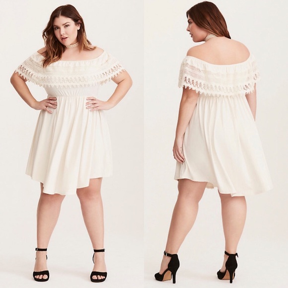 white flowy off the shoulder dress